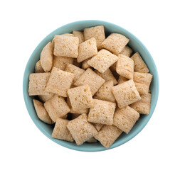 Bowl of delicious corn pads isolated on white, top view