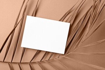 Invitation card mockup with palm tree leaf decoration