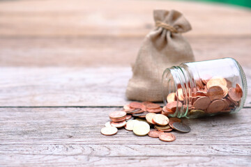 Coins on table background and saving money and business growth concept,finance and investment concept