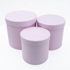 set of three pink tube boxes isolated on white background