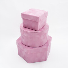 set of velvet pink boxes of different shapes isolated on white background
