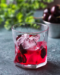 Cold sweet cherry non alcohol drink with ice