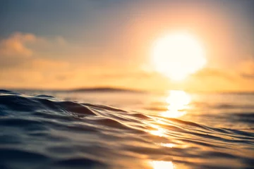 Foto op Aluminium Ocean wave close up, low angle view, sunrsie shot © ValentinValkov