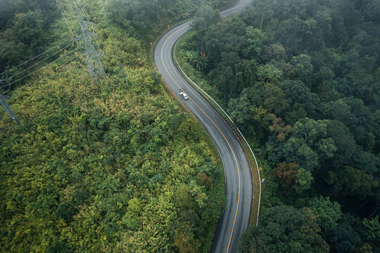 Mountain road in rainy and foggy day © artrachen