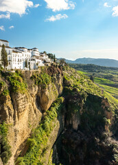 Ronda, Spain: Landscape of white houses on the green edges of steep cliffs