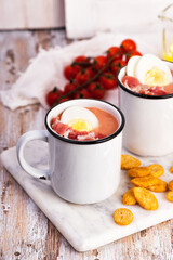 Spanish salmorejo cream soup with ham and egg
