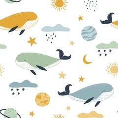 Cute whales among the clouds and planets. Seamless background in pastel colors.