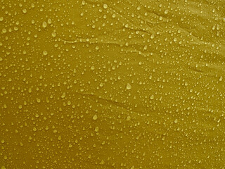Water drops on waterproof membrane fabric. Morning dew on tent.