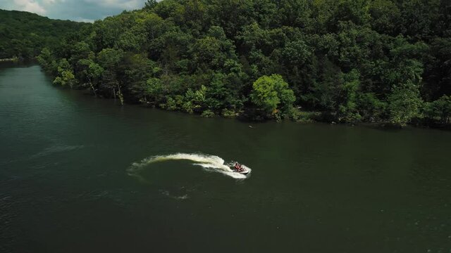 Aerial photography is an epic shot of jet ski racing on a large river. High quality 4k footage