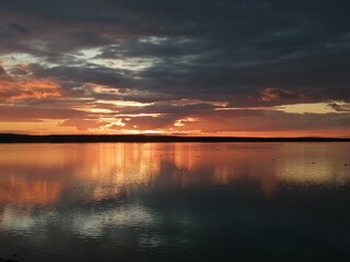 Fototapeta premium sunset over the lake