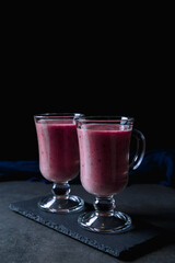 Banana-blackberry smoothie made from frozen fruits.