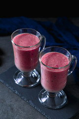 Banana-blackberry smoothie made from frozen fruits.