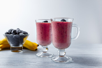 Banana-blackberry smoothie made from frozen fruits.