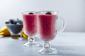Banana-blackberry smoothie made from frozen fruits.