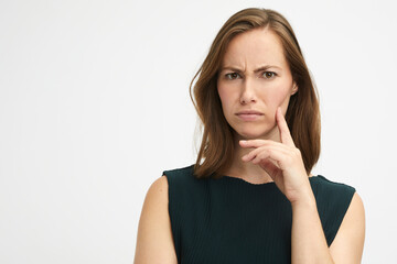 Portrait of a beautiful young businesswoman looking serious and a bit angry