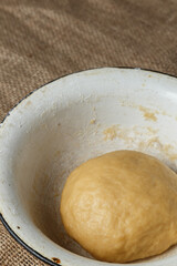 Rye and wheat dough in a bowl.