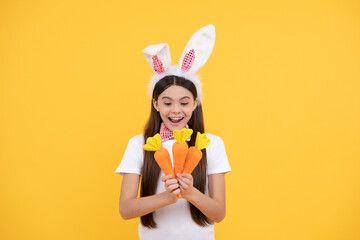 Easter time. just having fun. ready for party. happy childhood. cheerful bunny kid with carrot