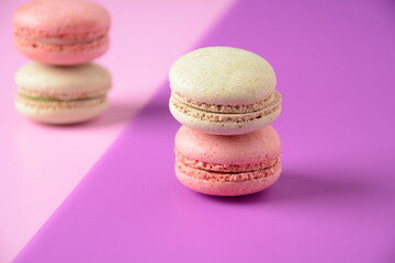 Colorful macarons cakes. Small French cakes. Sweet and colorful french macaroons, colorful almond cookies, pastel colors