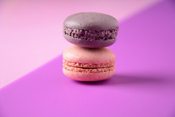 Colorful macarons cakes. Small French cakes. Sweet and colorful french macaroons, colorful almond cookies, pastel colors