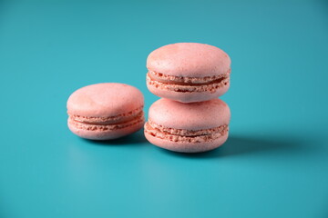 Colorful macarons cakes. Small French cakes. Sweet and colorful french macaroons, colorful almond cookies, pastel colors