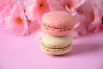 Colorful macarons cakes. Small French cakes. Sweet and colorful french macaroons, colorful almond cookies, pastel colors