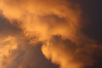 Clouds illuminated at sunrise.