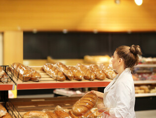 Choosing food from shelf in supermarket,bakery,Grocery stores