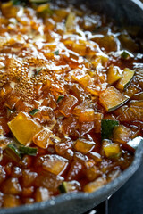 The steps for making winter melon tea, the winter melon grains and brown sugar are boiled in a pot