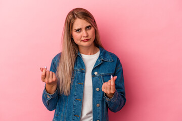 Young russian woman isolated on pink background showing that she has no money.