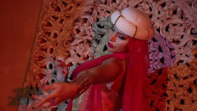 sultana is dancing in harem at night, portrait of alluring and mysterious blonde woman