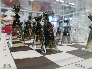Glass chess. Glass chess. Collectible chess in the close up