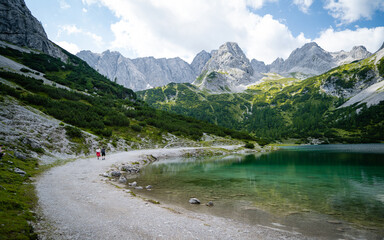 Idyllic alpine lake Seebensee, austrian alps, with view to mountain reflecting in the water. colorful summer landscape