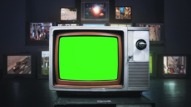 Old TV Green Screen Vintage Television Channels. Old tv green screen in front of many televisions with vintage movies