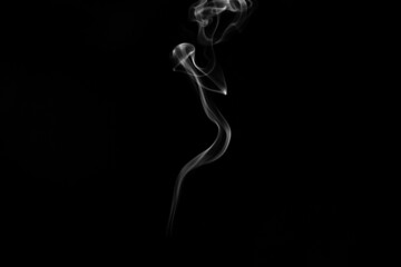 Smoke, clouds in a black background.