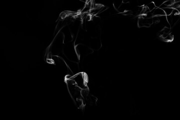 Smoke, clouds in a black background.