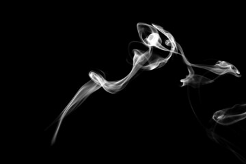 Smoke, clouds in a black background.