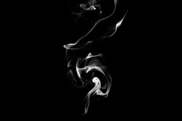 Smoke, clouds in a black background.