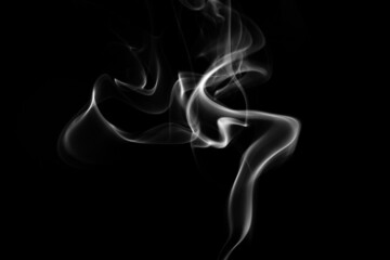 Smoke, clouds in a black background.