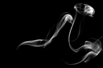 Smoke, clouds in a black background.