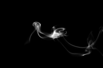 Smoke, clouds in a black background.