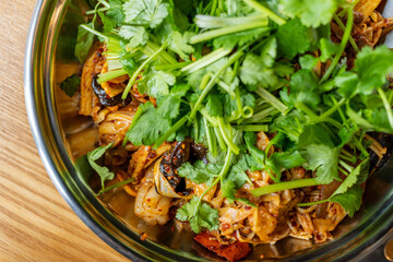 Malaxianguo, a Chinese spicy dish full of herb cilantro.