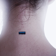 USB plug integrated into the neck of a person illustrating human and technology merging. Isolated...