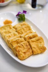 A delicious Chinese dish, deep-fried tofu with milk