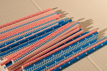 Color straws for gender reveal party, birth child baby shower concept boy or girl. Pink and blue