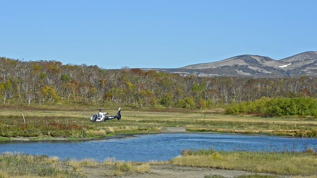 nature helicopter on riverbank Contemporary aircraft Avki