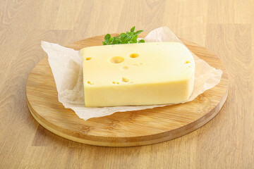Maasdam cheese over the board