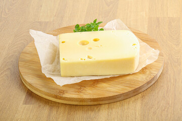 Maasdam cheese over the board