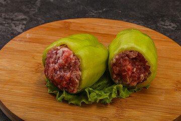 Raw stuffed pepper for cooking