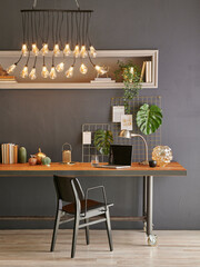 Decorative office corner style with lamp and wooden table, book ornament object style.