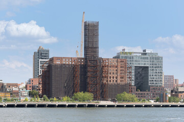 Brooklyn, NY - USA - July 30, 2021 Horitzontal view of Domino Park a 5-acre public park in the Williamsburg neighborhood of Brooklyn, New York City. Built on the former Domino Sugar Refinery site